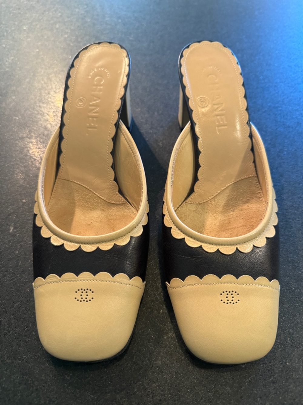 CHANEL Two-Tone Scalloped Leather Mules - Black & Cream